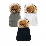 Knit hat with fur bobble in grey